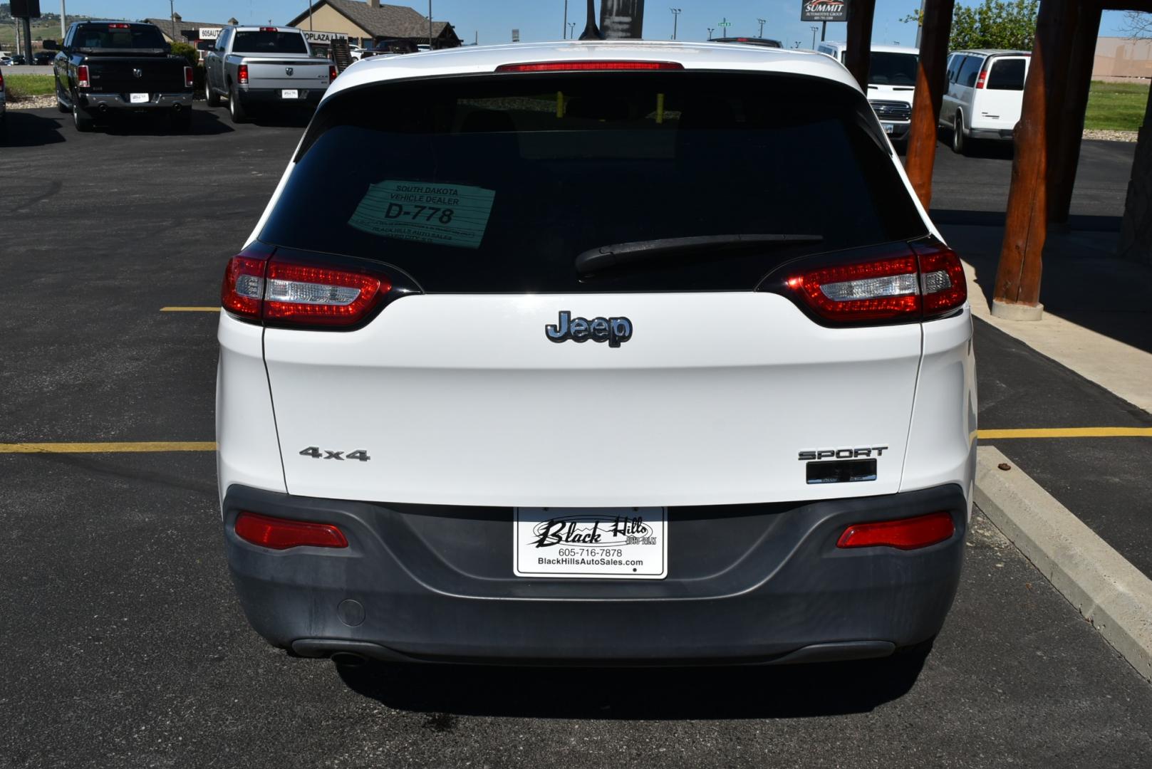 2016 White /Black Jeep Cherokee Sport (1C4PJMAB3GW) with an 2.4L 4 Cyl Multi-Air engine, 9-Speed Automatic transmission, located at 1600 E Hwy 44, Rapid City, SD, 57703, (605) 716-7878, 44.070232, -103.171410 - Photo#6